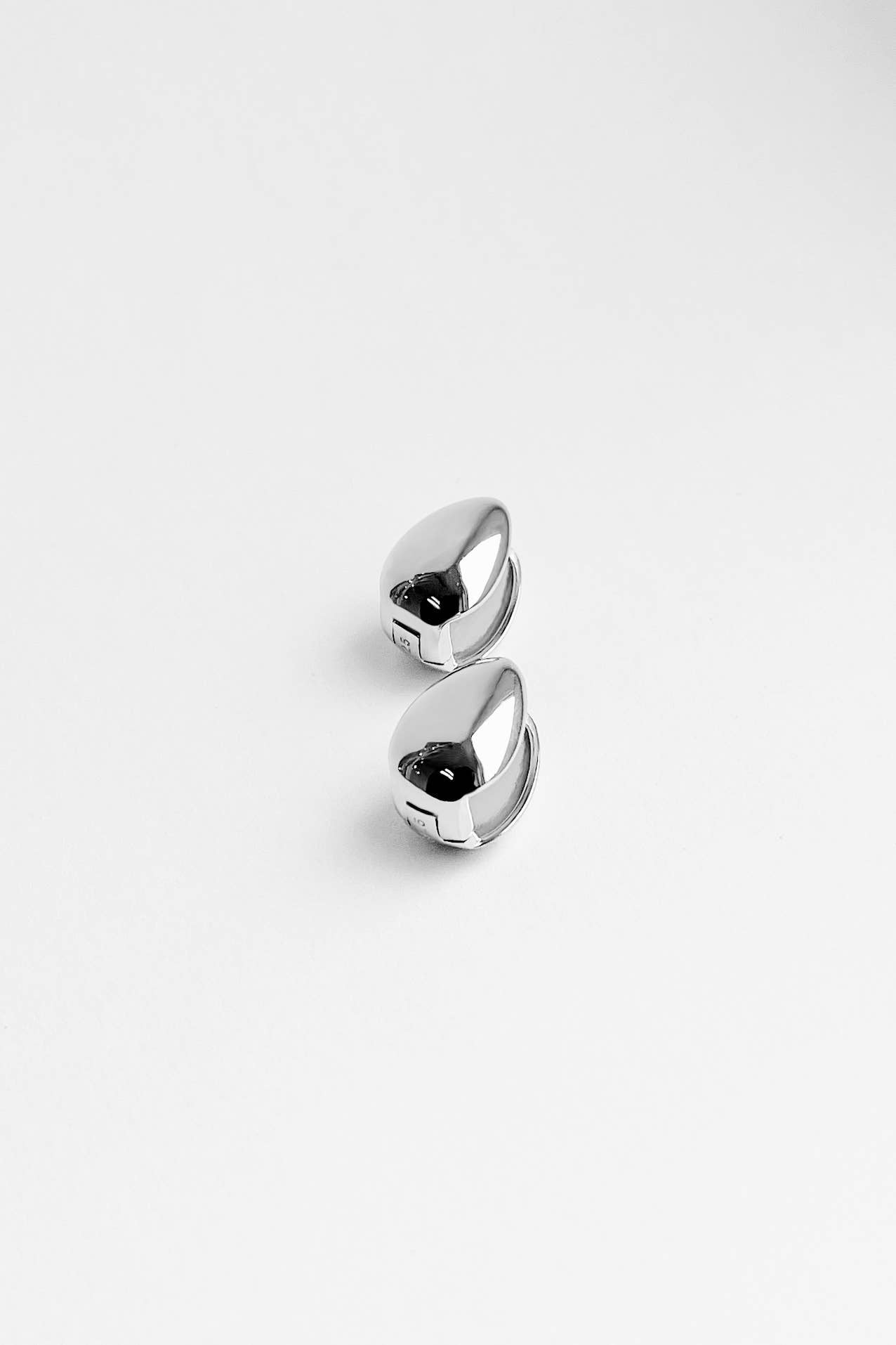 Almond Huggie Hoops: Sterling Silver