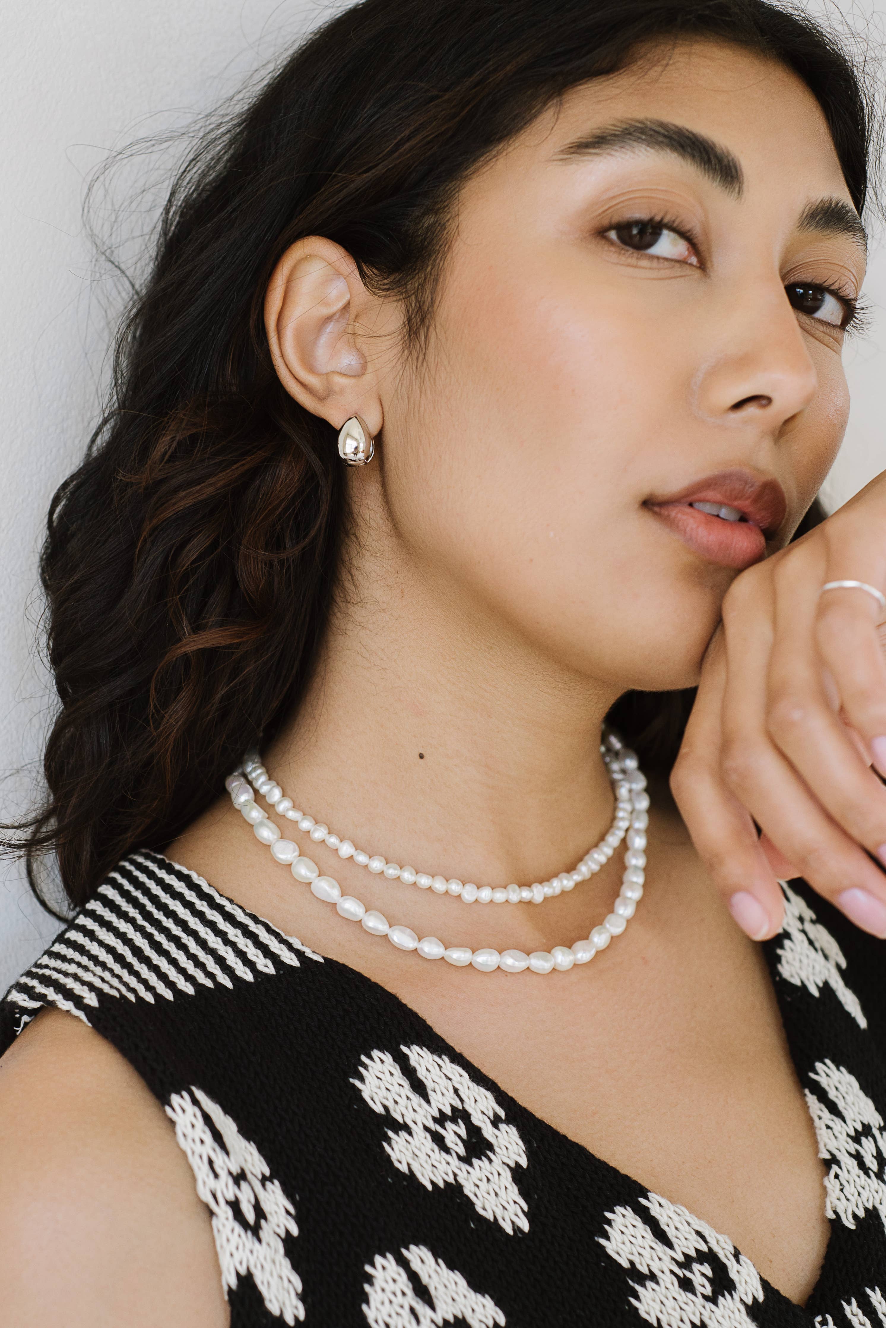 Almond Huggie Hoops: Sterling Silver